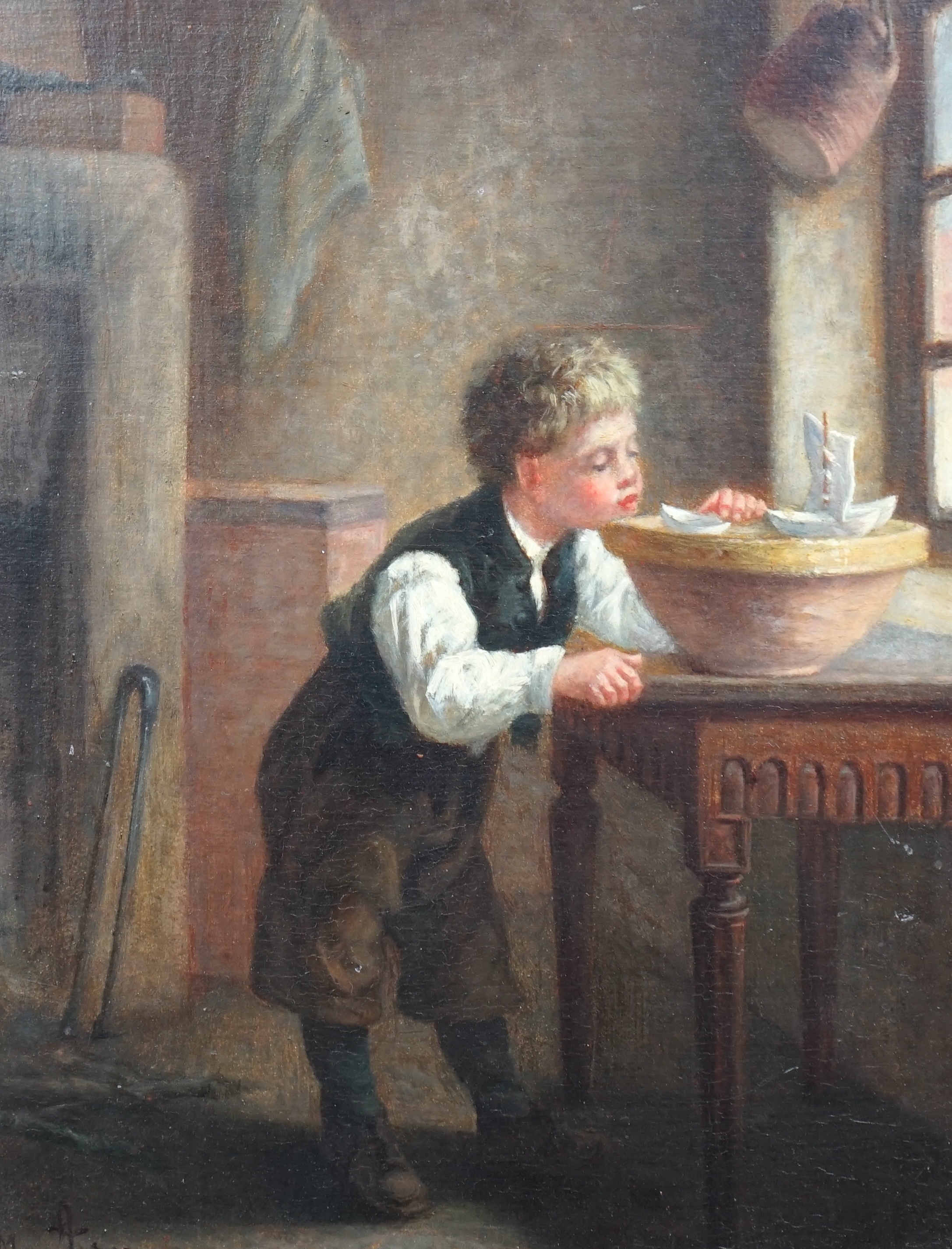 Michel Arnoux (French, 1833-1877), oil on mahogany panel, Interior with boy playing with model sailing boats, signed, 24 x 18cm. Condition - fair to good